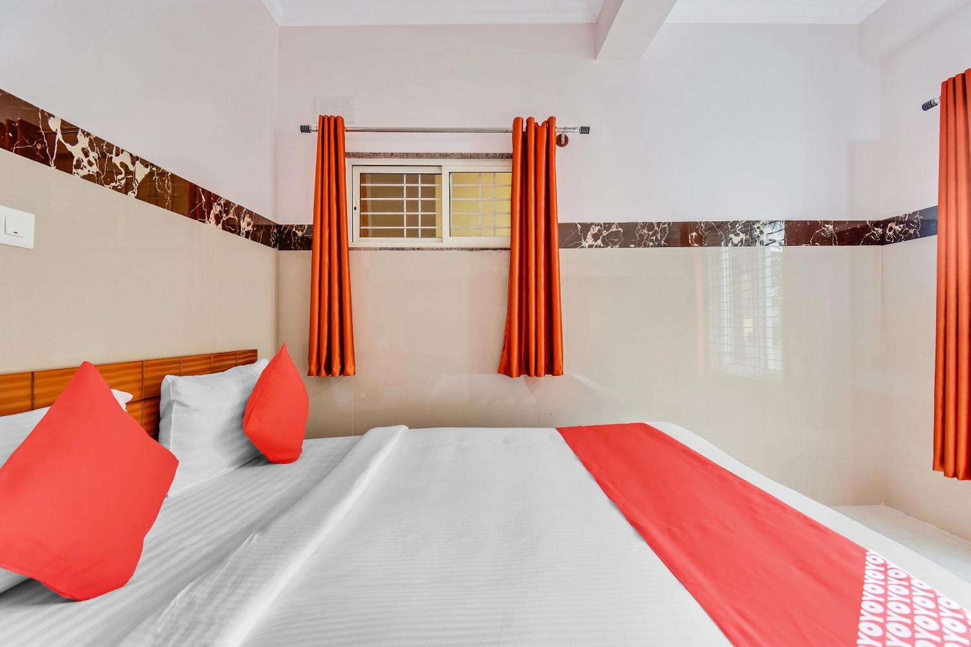 Hotel O Sri Sai Guru Comforts Yelahanka Eksteriør bilde